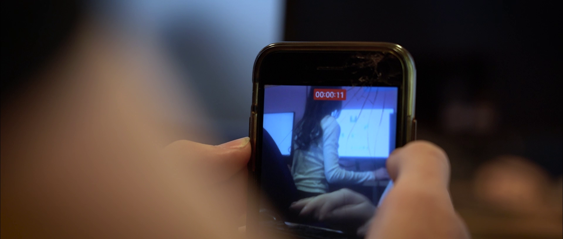recording girl on phone