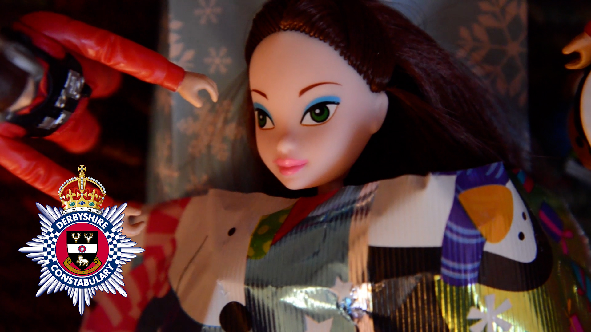 A doll is being attended to by a Rebel Alliance X-Wing pilot, in a mock collision.