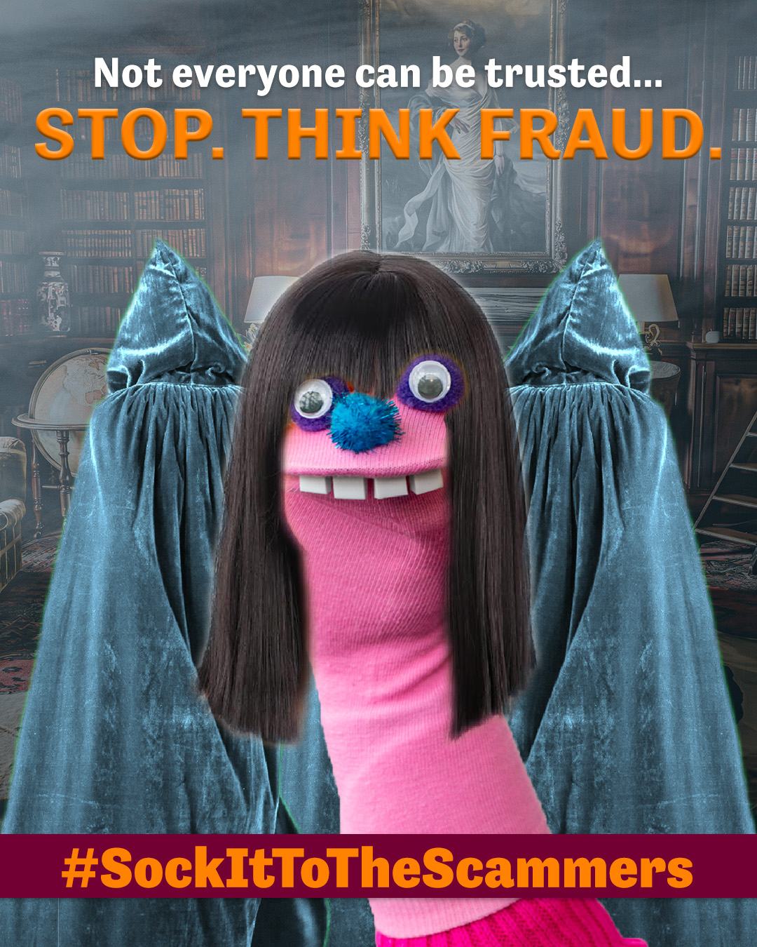 A sock puppet wears a dark, heavy fringed wig surrounded by people in cloaks.