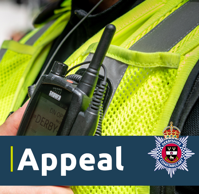 Close up of a police radio with the word 'Appeal' on a banner underneath.