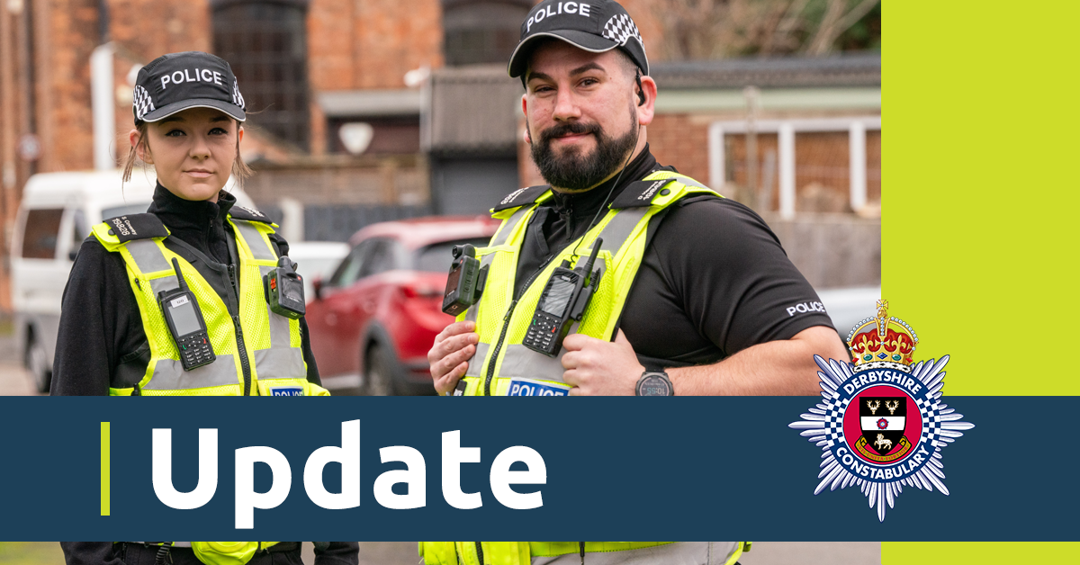 An image of two officers in uniform. There is also a blue banner with the word update and the Derbyshire Constabulary crest 