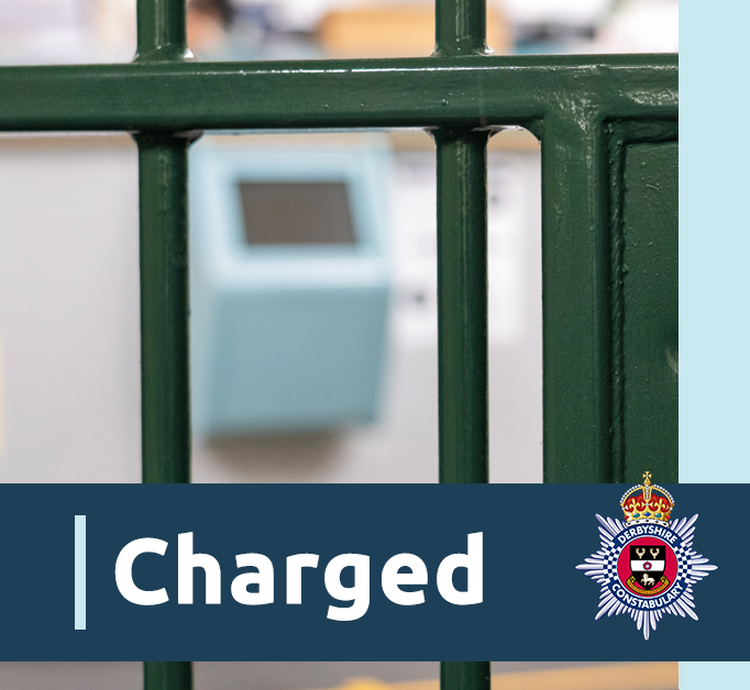 Custody door with the word charged 