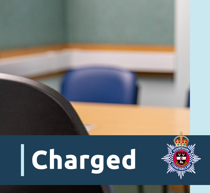Image of chair in interview room overlaid with word 'charged'