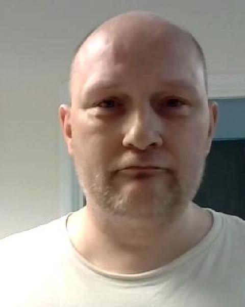 Image of Edwin Newman who has failed to return to HMP Sudbury. The 45-year-old is described as being white with a bald head and stubble.