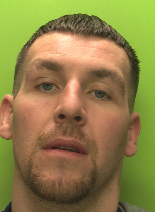 Custody image of Nathan Grant who has been jailed for assaulting, threatening and harrassing his partner