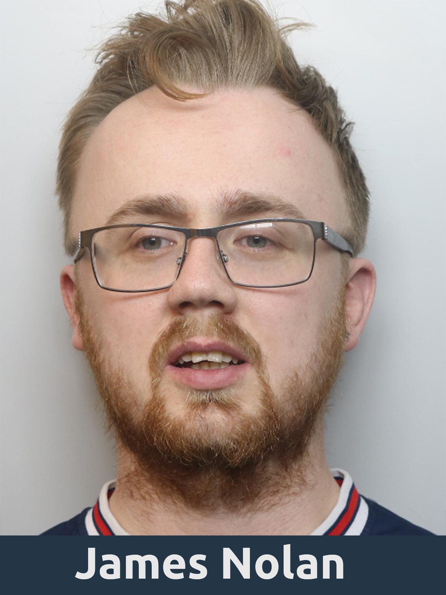 Man with light coloured hair and facial hair who is wearing glasses