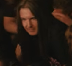 Man with long brown hair